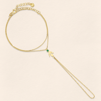Alka Emerald Gold Finger Bracelet